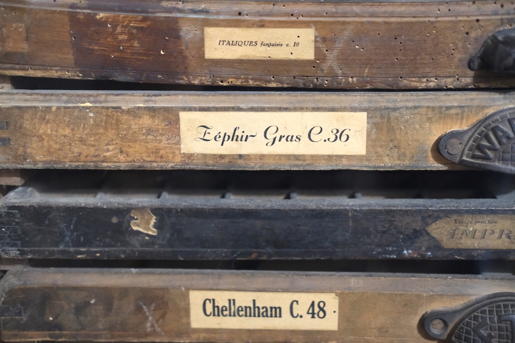 Photograph of wooden draws containing moveable type